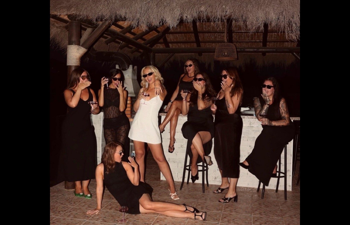 Women dressed for a warm stylish evening together